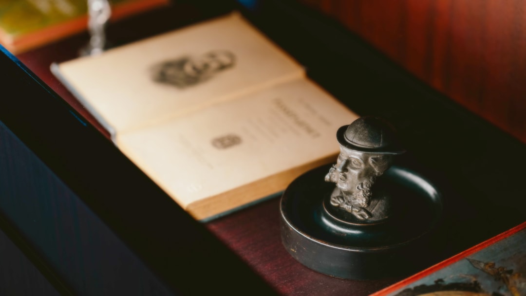 An open book sitting on top of a wooden table